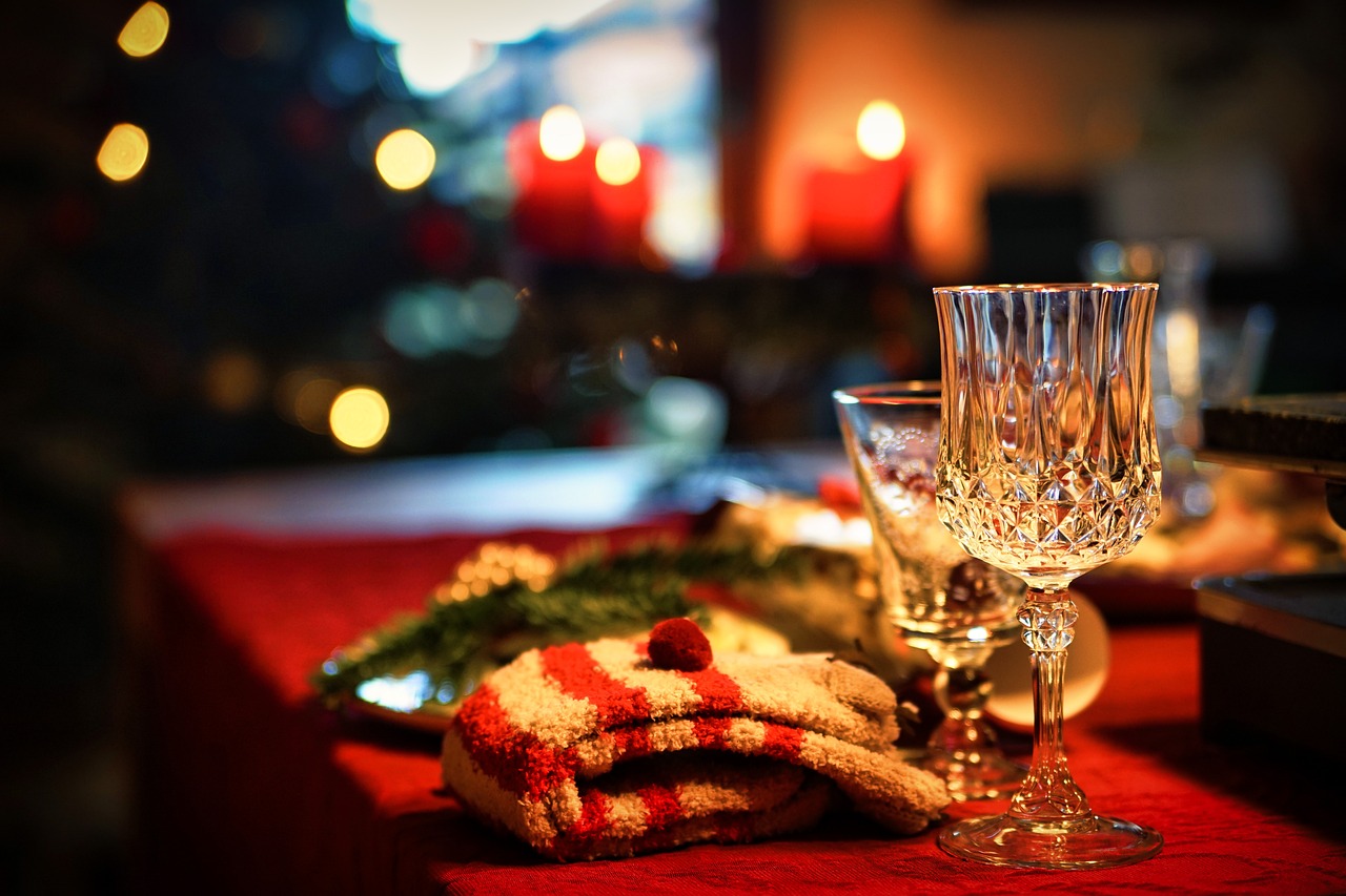 Christmas celebrations with a glass and a sock on the picture.